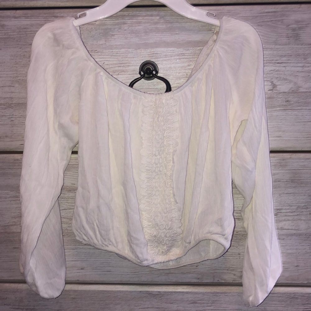 A white cropped blouse like shirt
